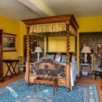 Pilgrims Manor four-poster bedroom