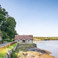 The Bathing Hut sat beside the river